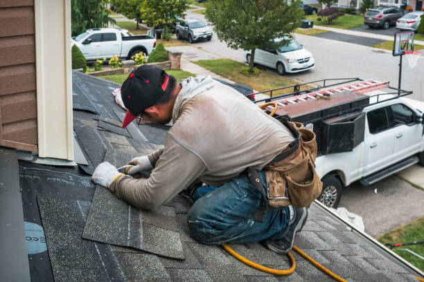 Professional Roofing technician working in Newberry, MI